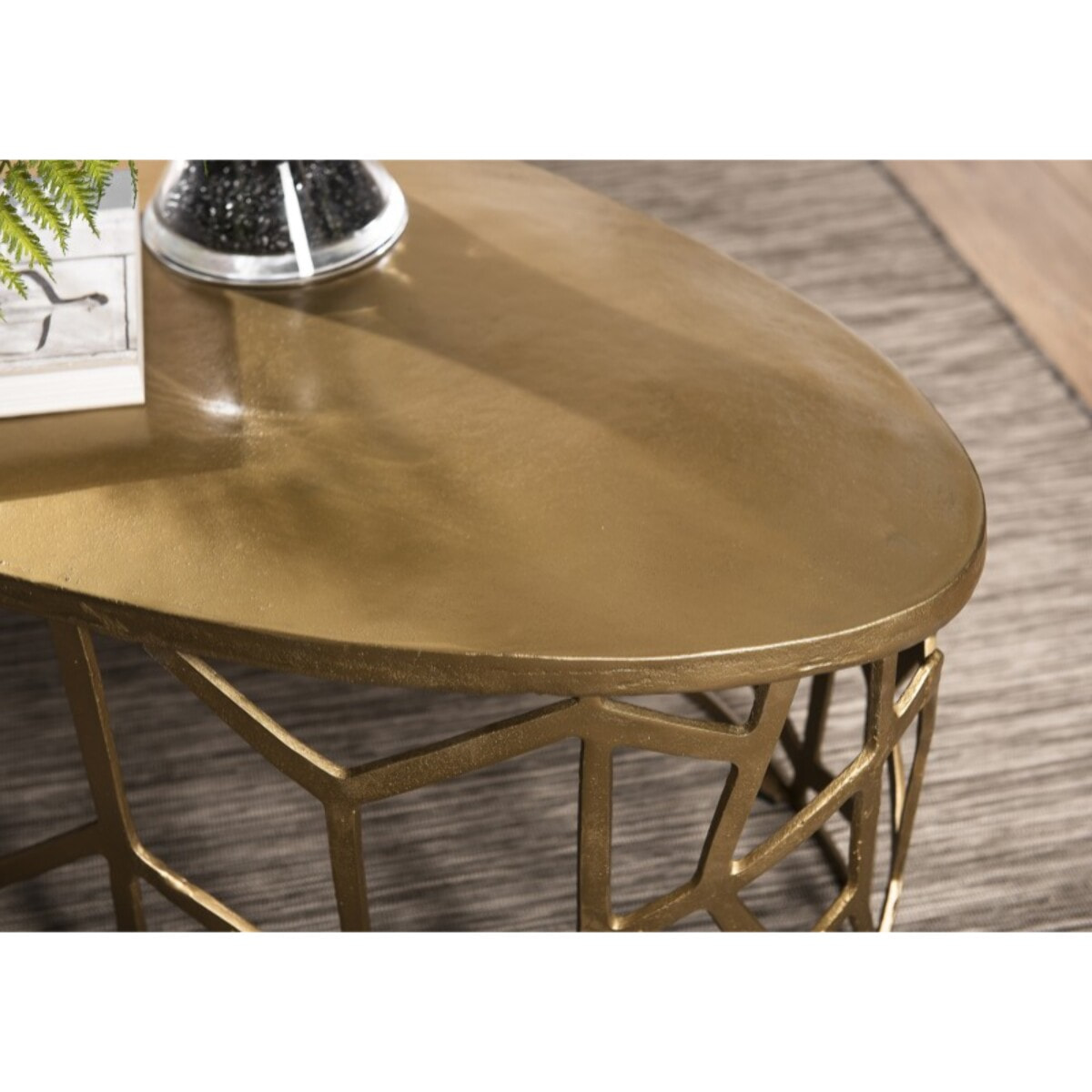 JOHAN - Table basse ovale 150x60cm aluminium doré piètement graphique