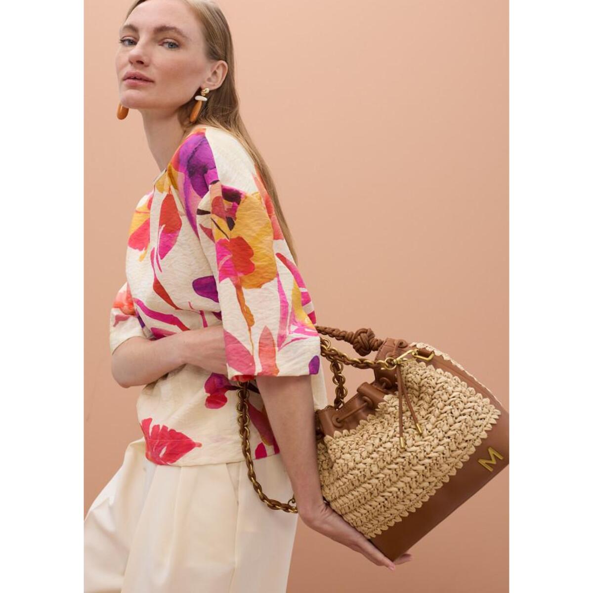 Blusa a maniche corte con stampa floreale