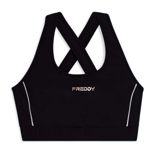 Top tecnico con spalline incrociate e profili bianchi