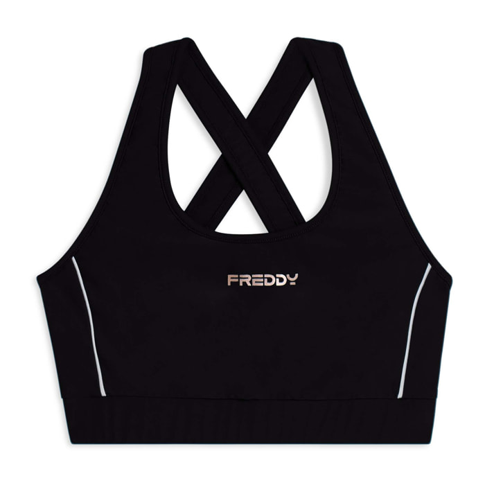 Top tecnico con spalline incrociate e profili bianchi