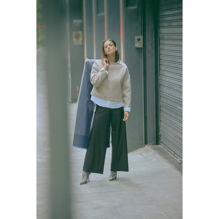 Pantaloni larghi effetto pelle nera