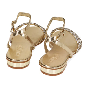 Sandalias doradas con brillos