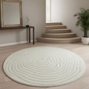 Tapis rond tendance ton sur ton aux motifs simples et à la forme originale