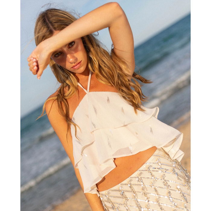 Top de mujer de gasa con volantes y cuello halter ajustable.