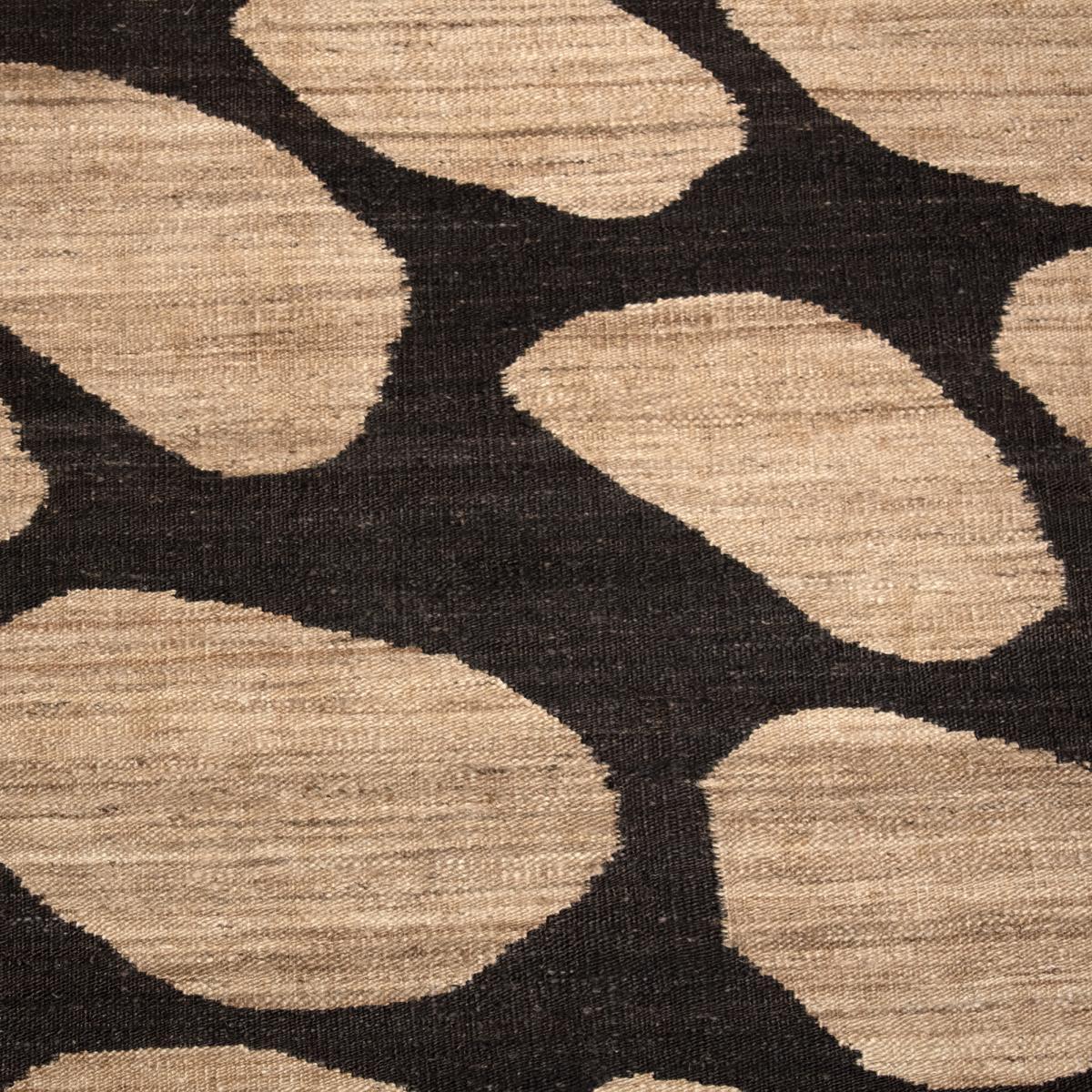 Tapis Kilim FIca tissé à la main en jute avec des formes rondes pour motif