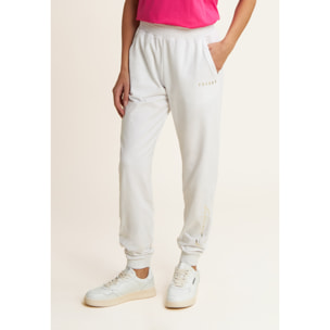 Pantaloni con elastico sul fondo e dettagli floreali