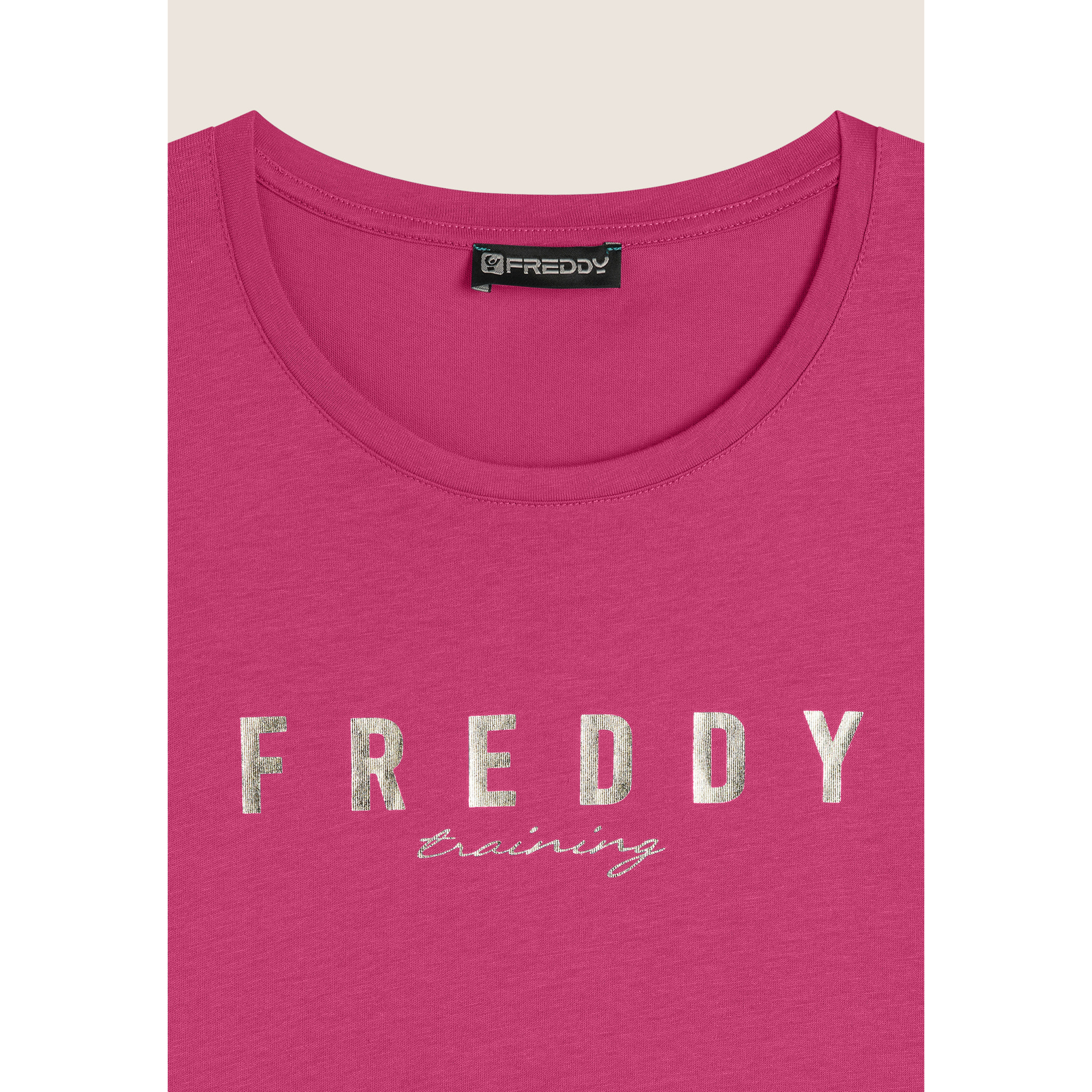 T-shirt in jersey con logo oro chiaro sul fronte