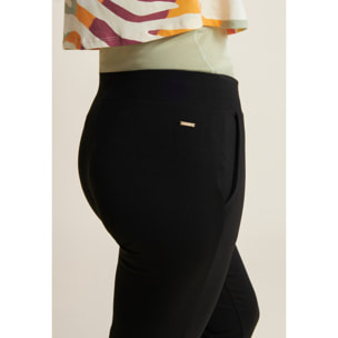 Pantaloni regular con spacchi e coulisse animalier