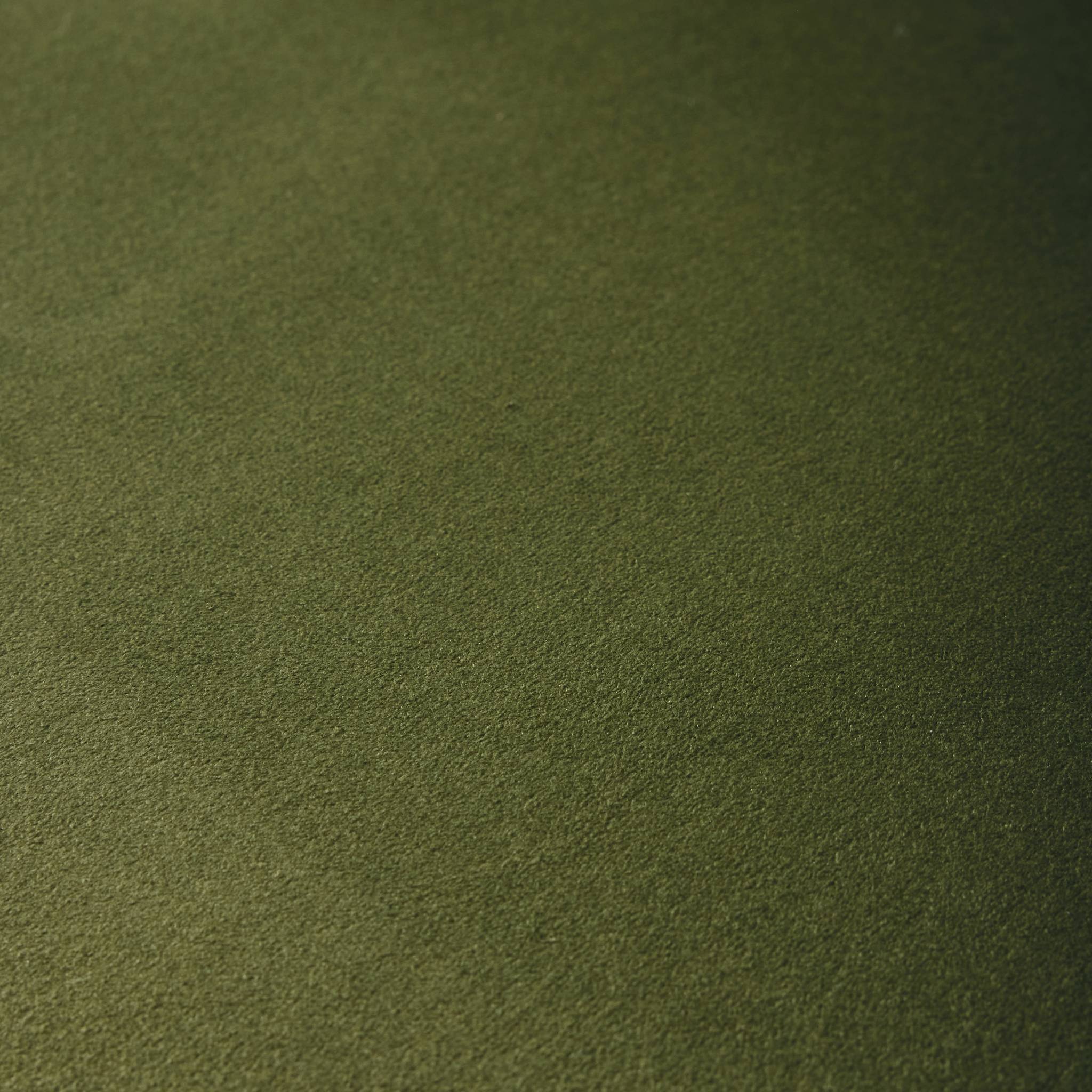 Fauteuil tripode en velours vert