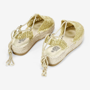 Alpargatas de plataforma doradas con esparto