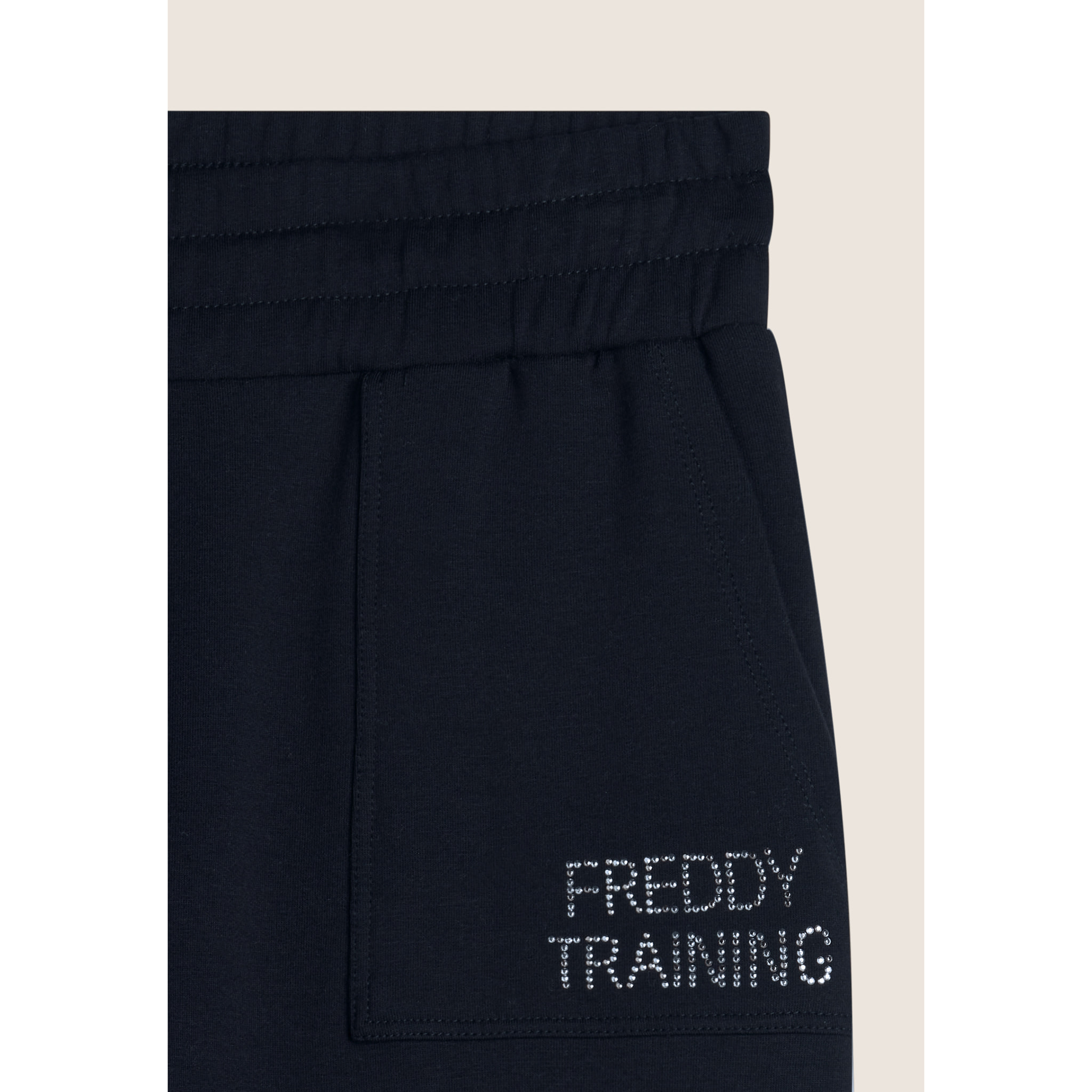 Pantalone donna slim fit con tasche applicate e maxi polsini