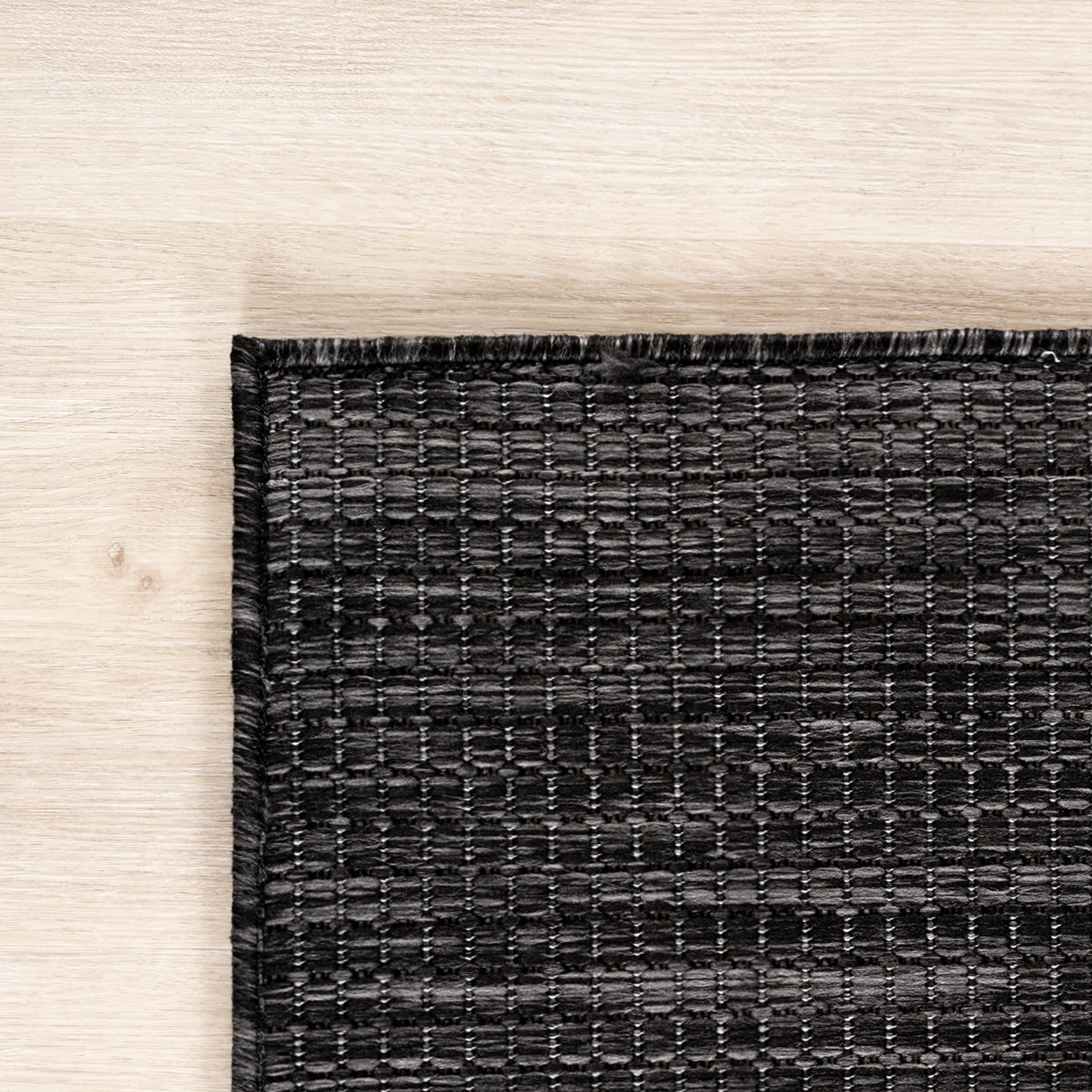 MIRA - Tapis intérieur/extérieur noir à aspect naturel
