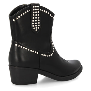 Botín cowboy con tachuelas para mujer.