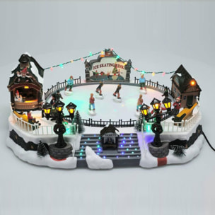 Pista de patinaje de decoración navideña con luces led y movimiento 21x22,5x39cm