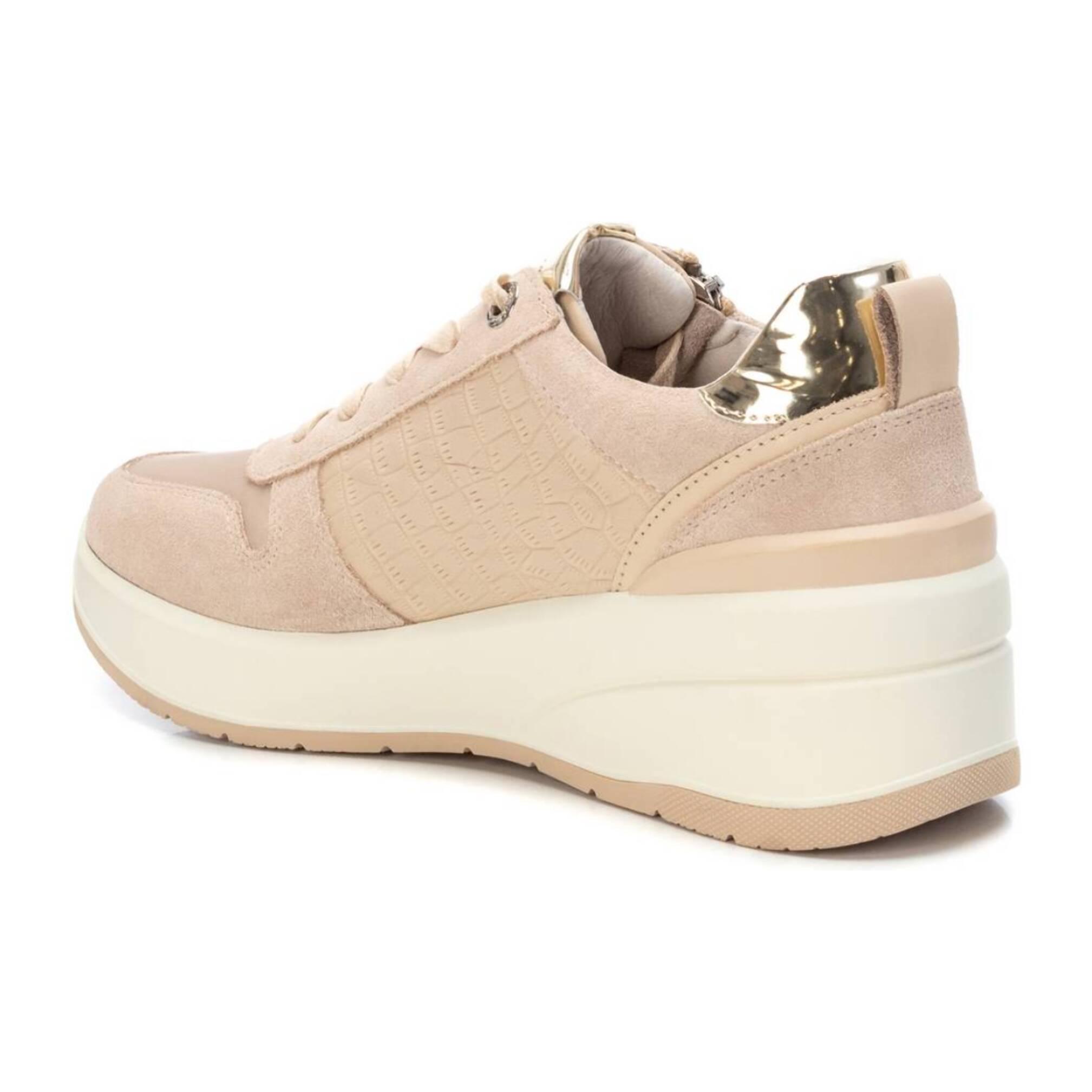 Zapatilla de piel beige