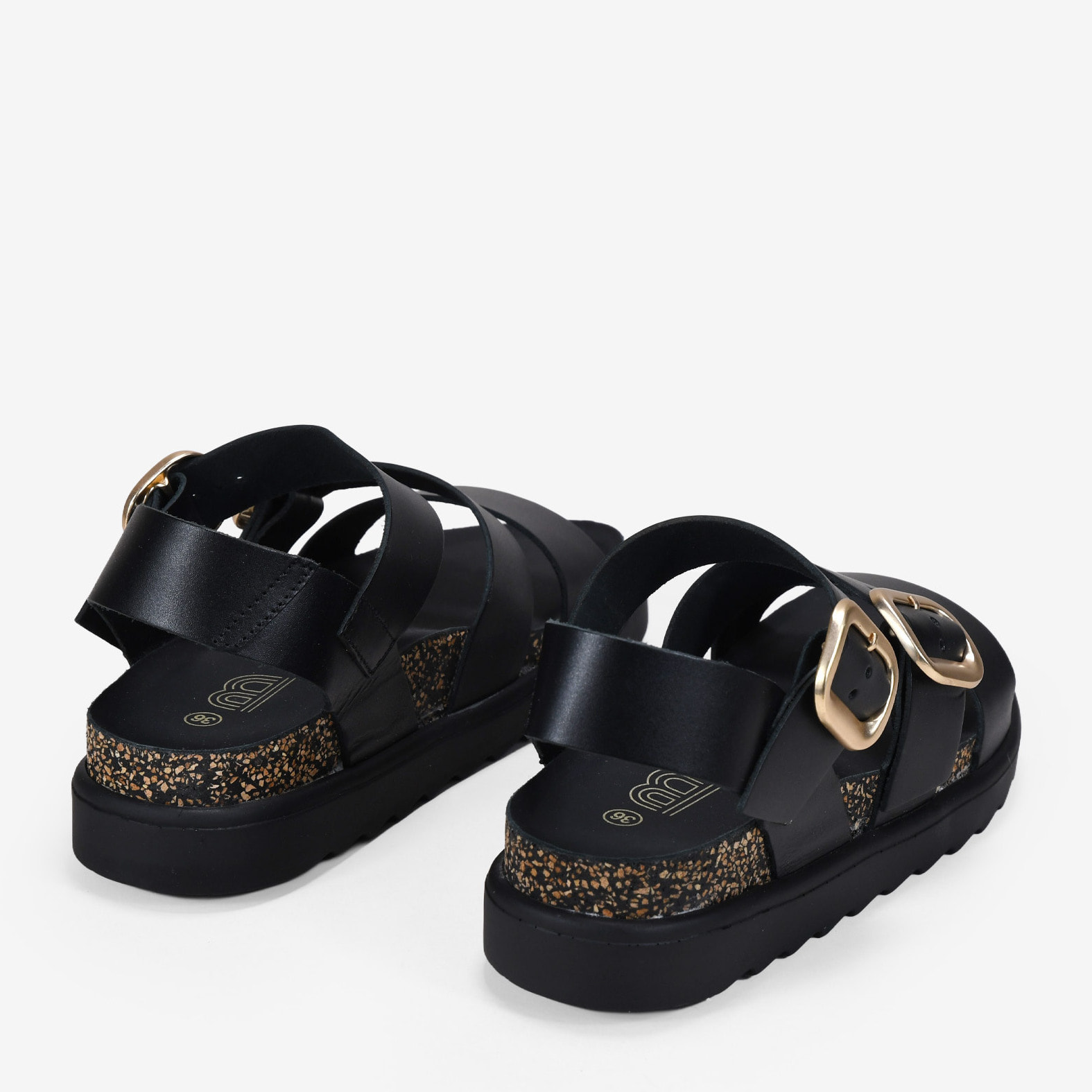 Sandalias de cuña negras en piel con hebillas