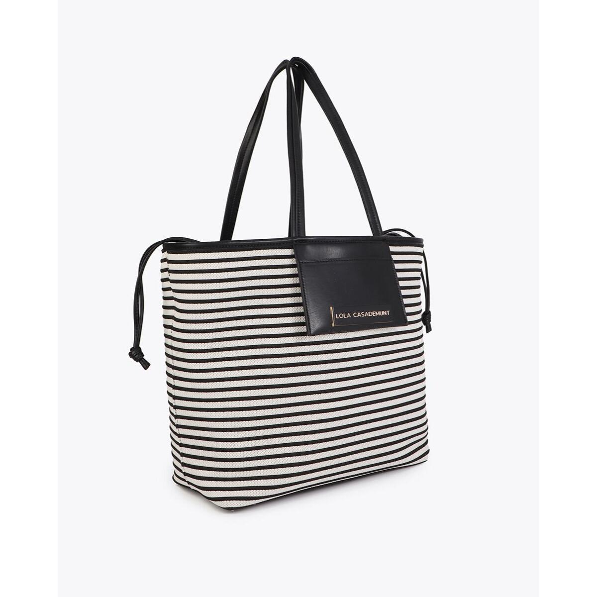 Shopper in tessuto a righe abbinato a un effetto pelle.