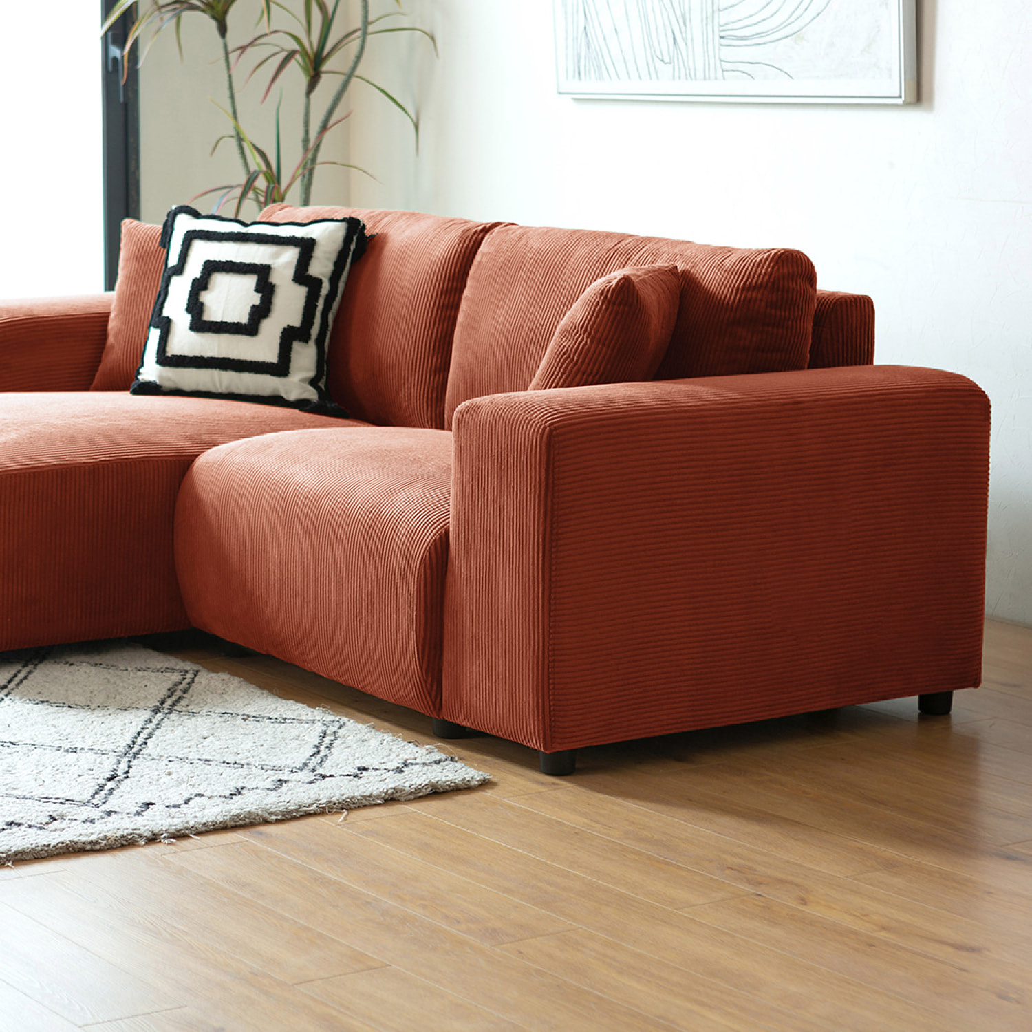 JAMBI Canapé d'angle modulable 3 places en velours côtelé terracotta