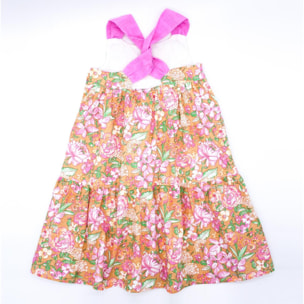 Vestido midi de popelín ocre flores rosas. Falda de volantes y tirantes cruzados en la espalda.
