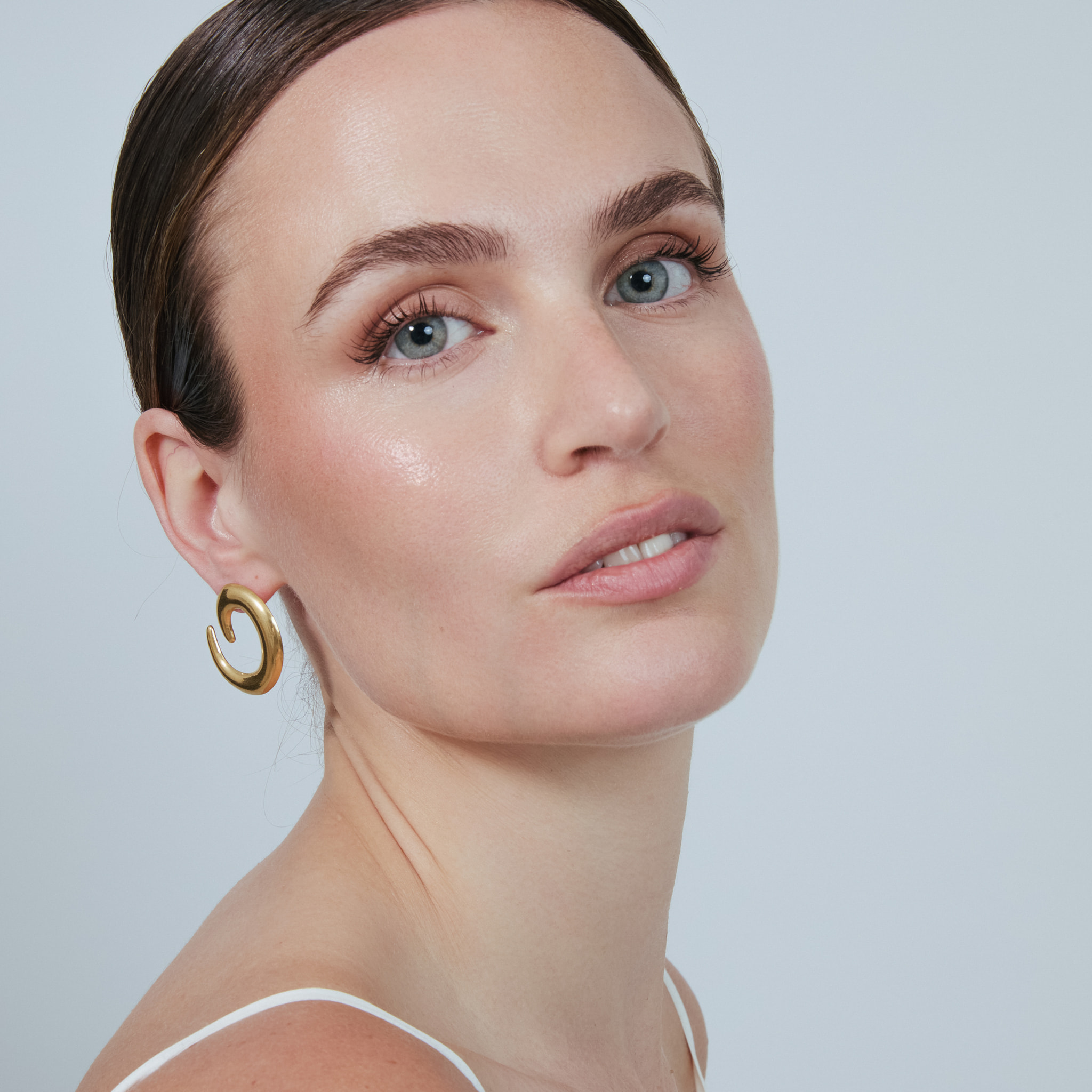 Pendientes Lesma acabado oro amarillo 18k