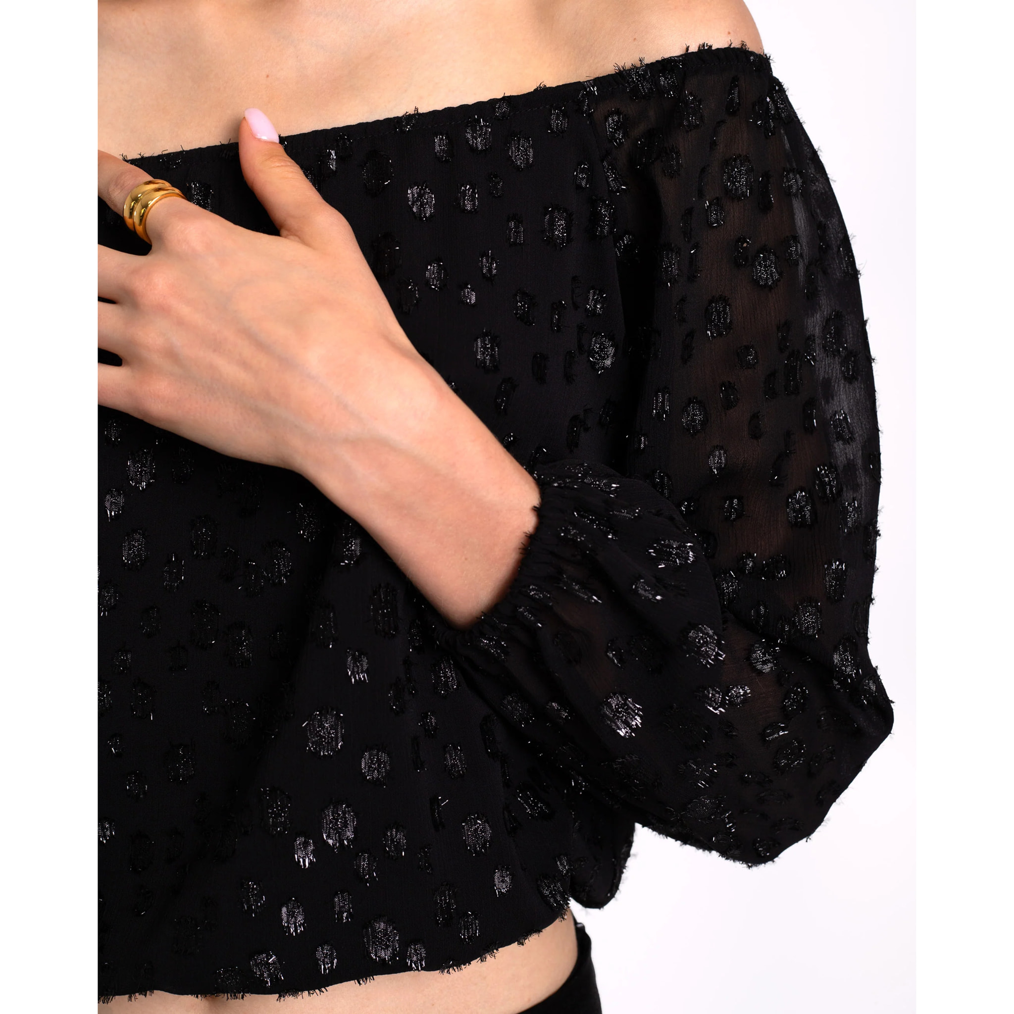 Blusa con brillo y escote bardot