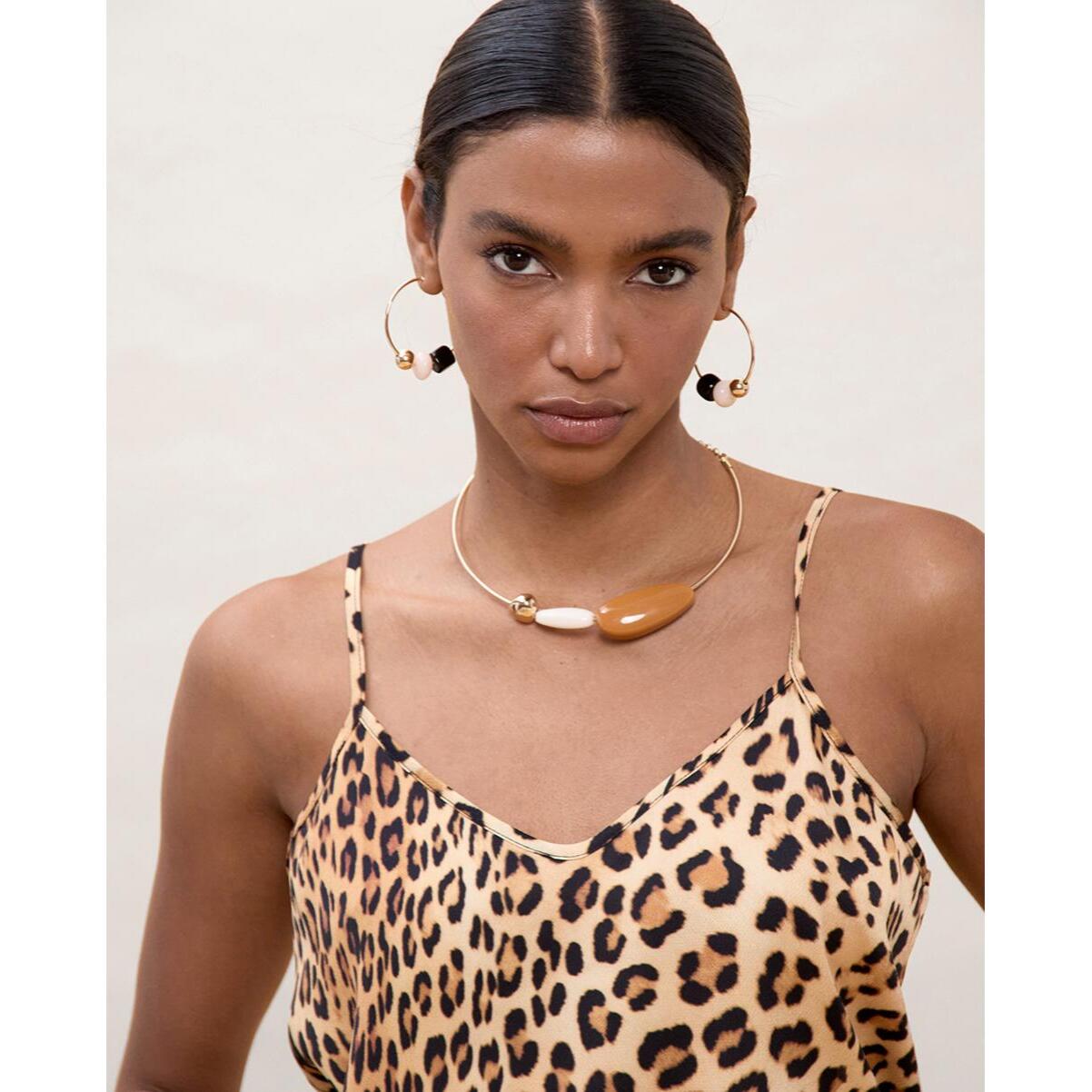 Top in pizzo con stampa animalier
