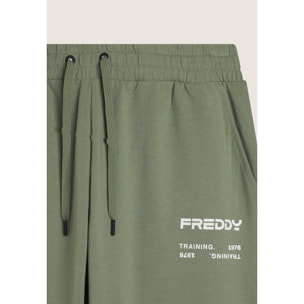 Pantaloni sportivi con bande laterali e fondo a polsino