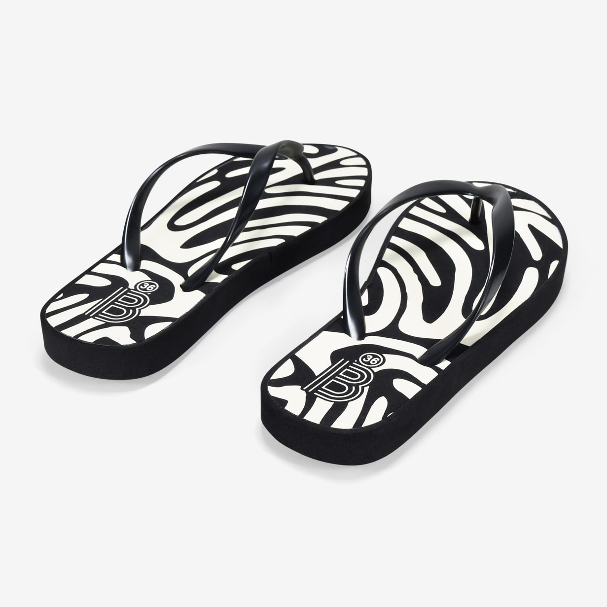 Chanclas de dedo negras de cebra