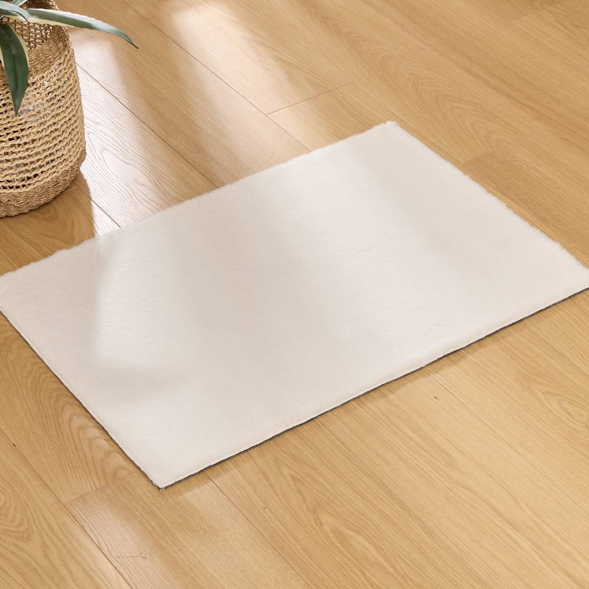 Tapis fausse fourrure Couka blanc 90x60cm