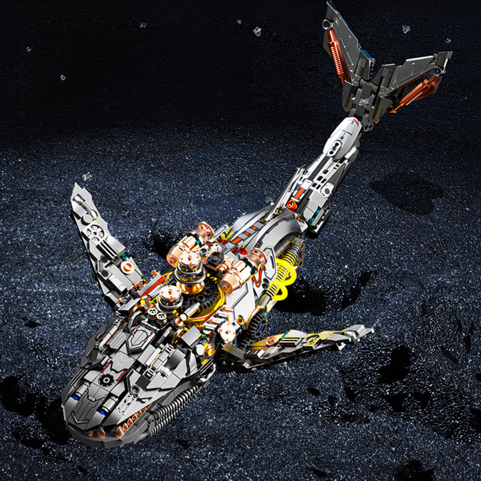 Maqueta 3D mecanizada de ballena con 1388 piezas, equipada con luces y mecanismo de manivela que permite movimiento dinámico.