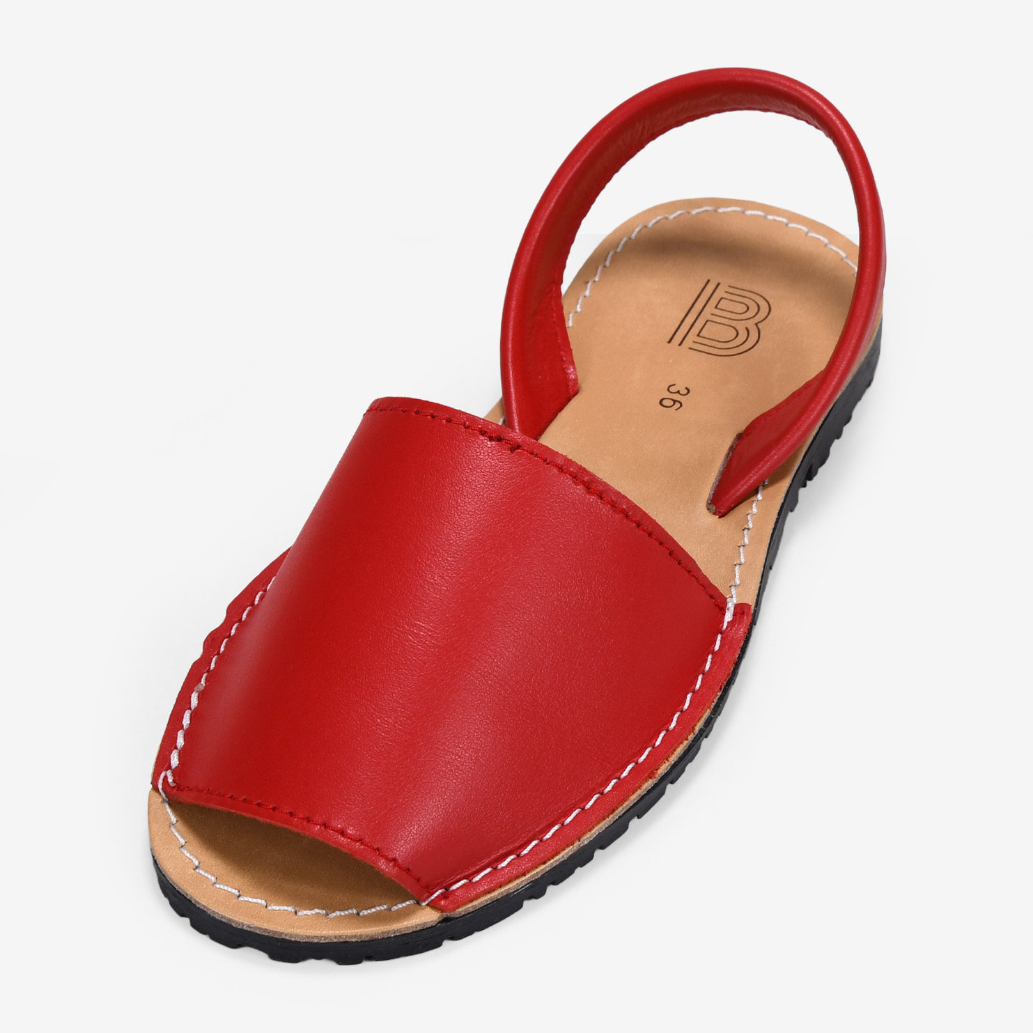 Abarcas planas en piel roja