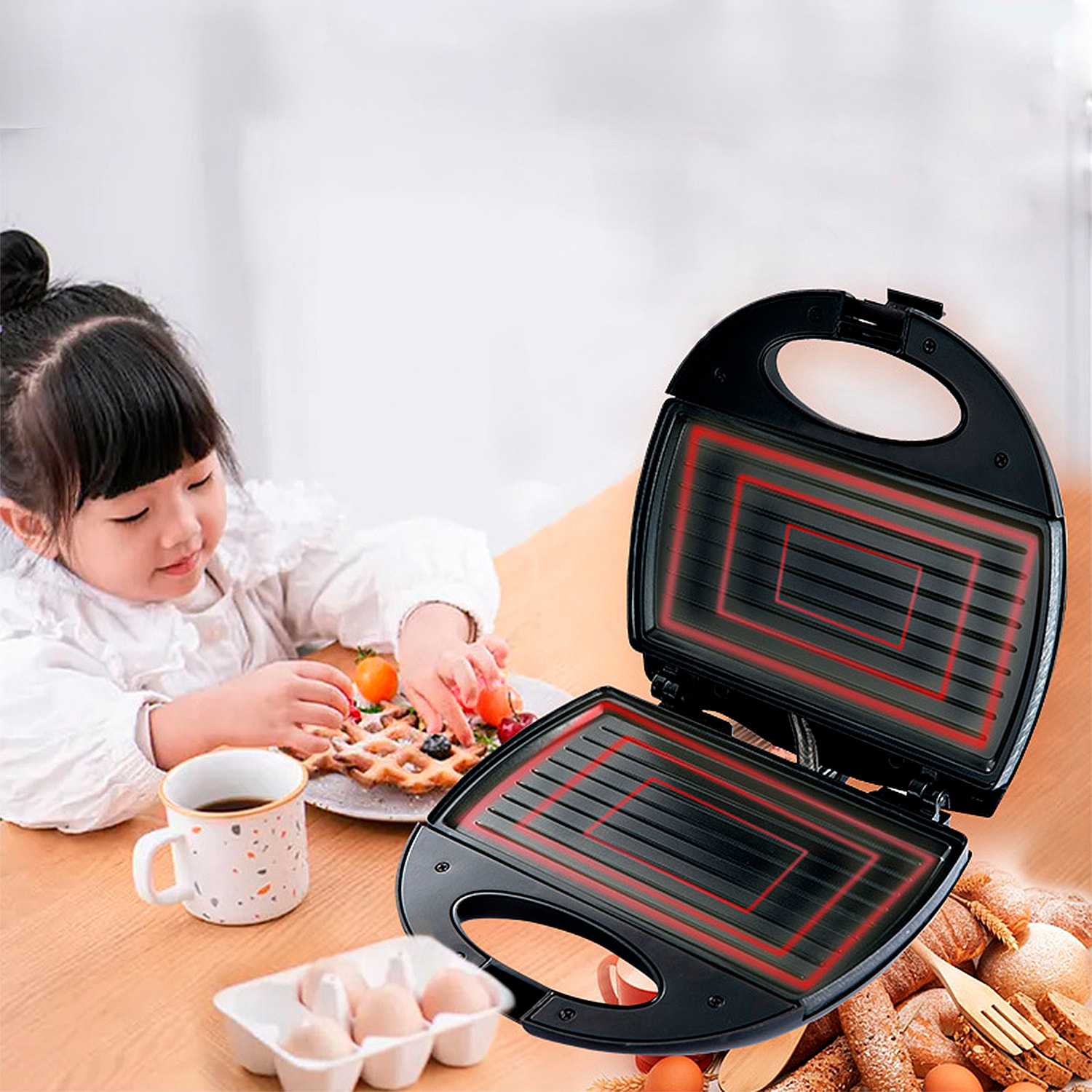 Sandwichera antiadherente con 750W de potencia y luz indicadora.