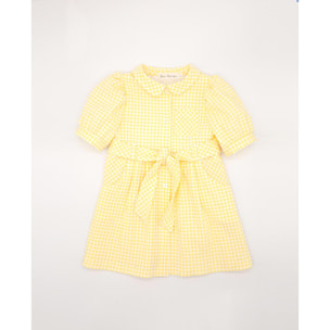 Vestido de manga corta de cuadros vichy amarillos. Bolsillos, cuello y cinturon. Botones en el centro.