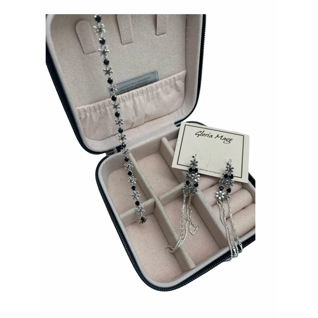 Joyero de viaje y Conjunto de Swarovski pendientes largos y pulsera con detalles de flor. Plata de ley 7-10 micras en color negro