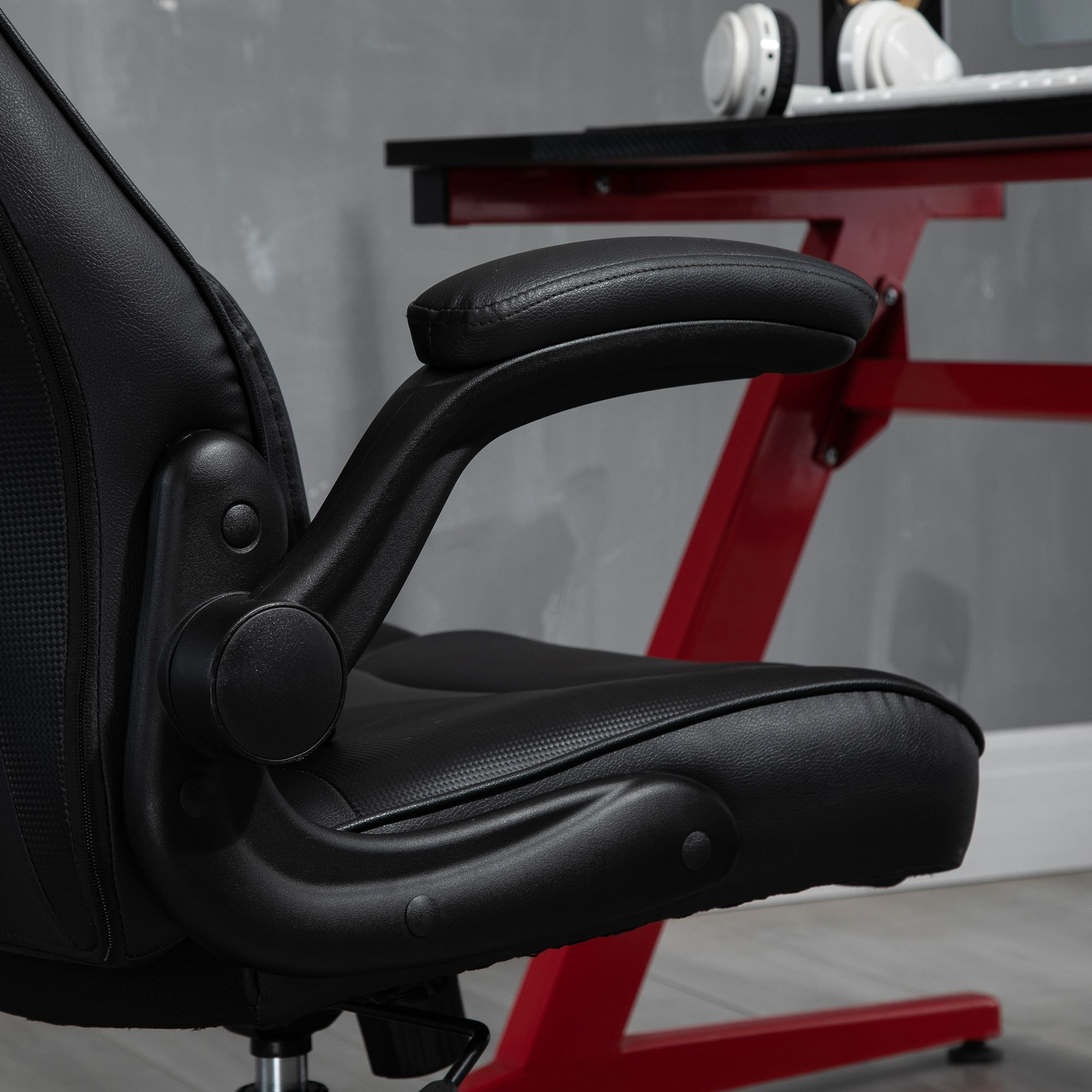 Fauteuil gaming base ronde métal pivotant hauteur réglable coussins noir