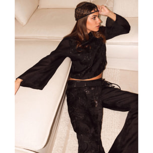 Pantalón con bordado y lentejuelas con capa superpuesta de mujer