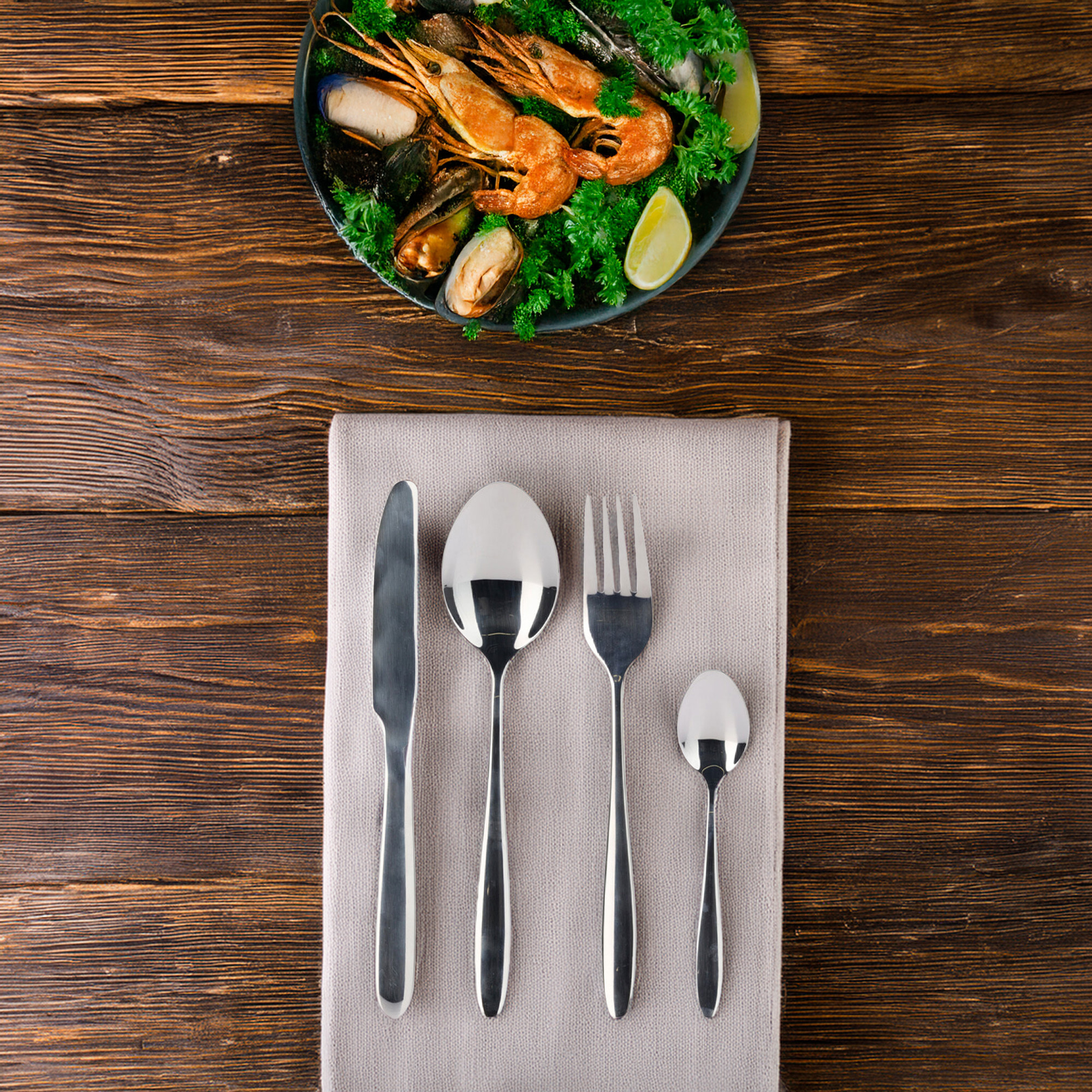 juego de 24 cubiertos de acero inoxidable con revestimiento plata