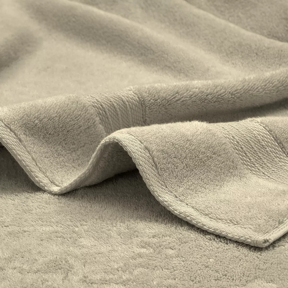 Serviette invites pur coton 550 g/m² uni beige Elea angora