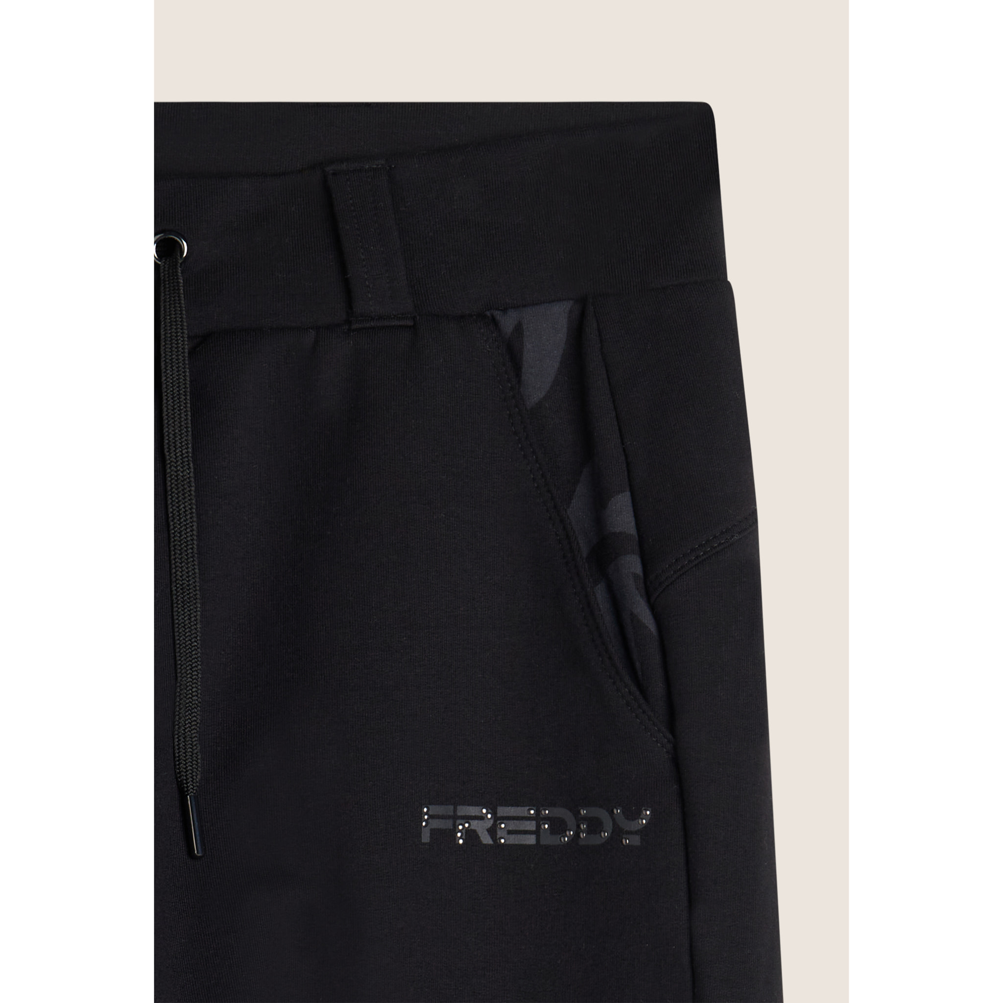 Pantaloni donna slim fit in felpa con apertura sul fondo