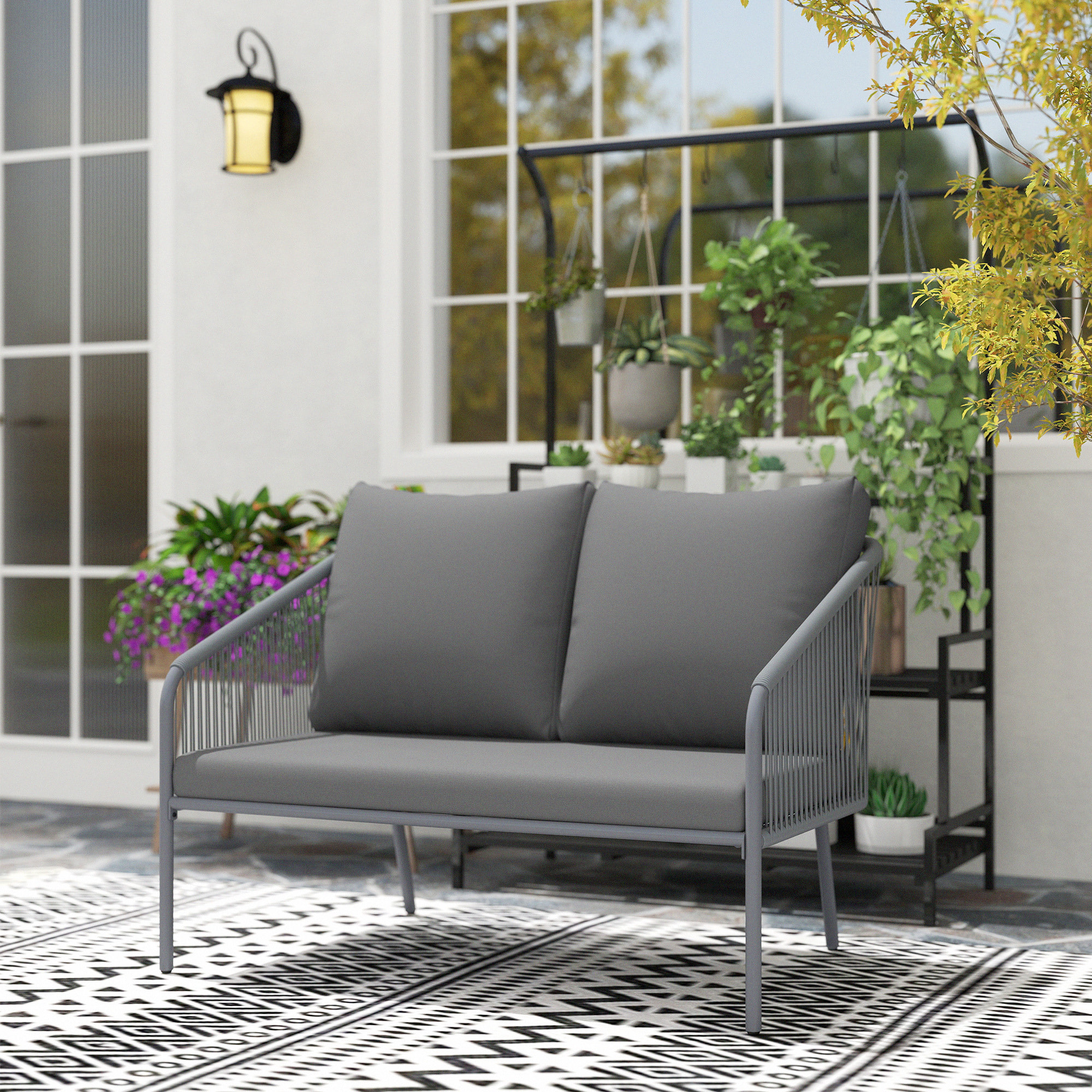 Canapé de jardin 2 places style bohème chic avec coussins assise dossier acier résine filaire gris