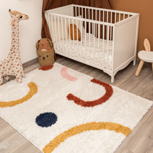 Aquarelle - tapis enfant en laine artificielle à motif ludique multicolore