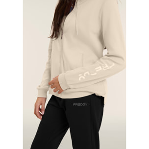 Tuta con zip e collo alto, logo con perline sulla manica