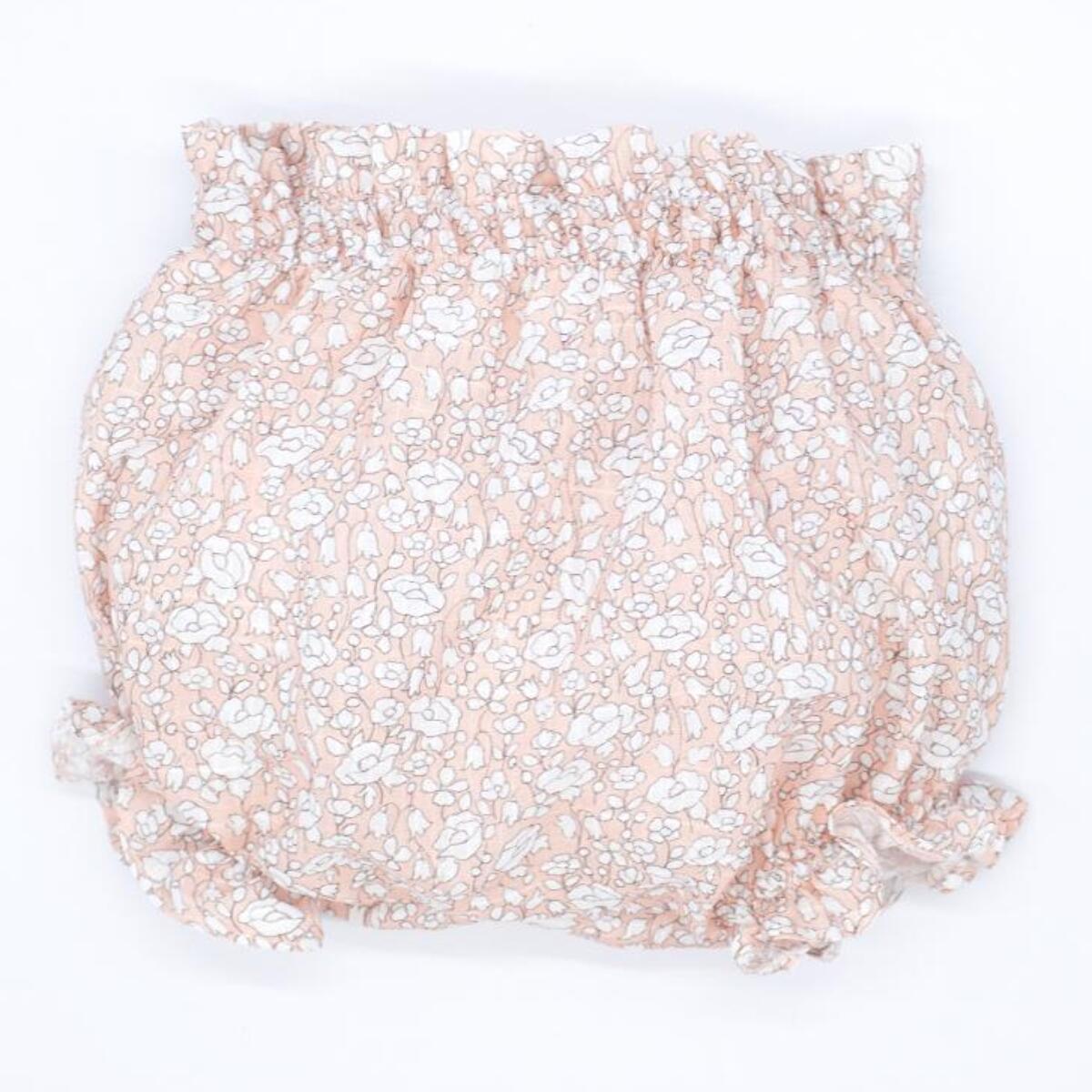 Ranita de flores rosas, goma en cintura y en las piernas.