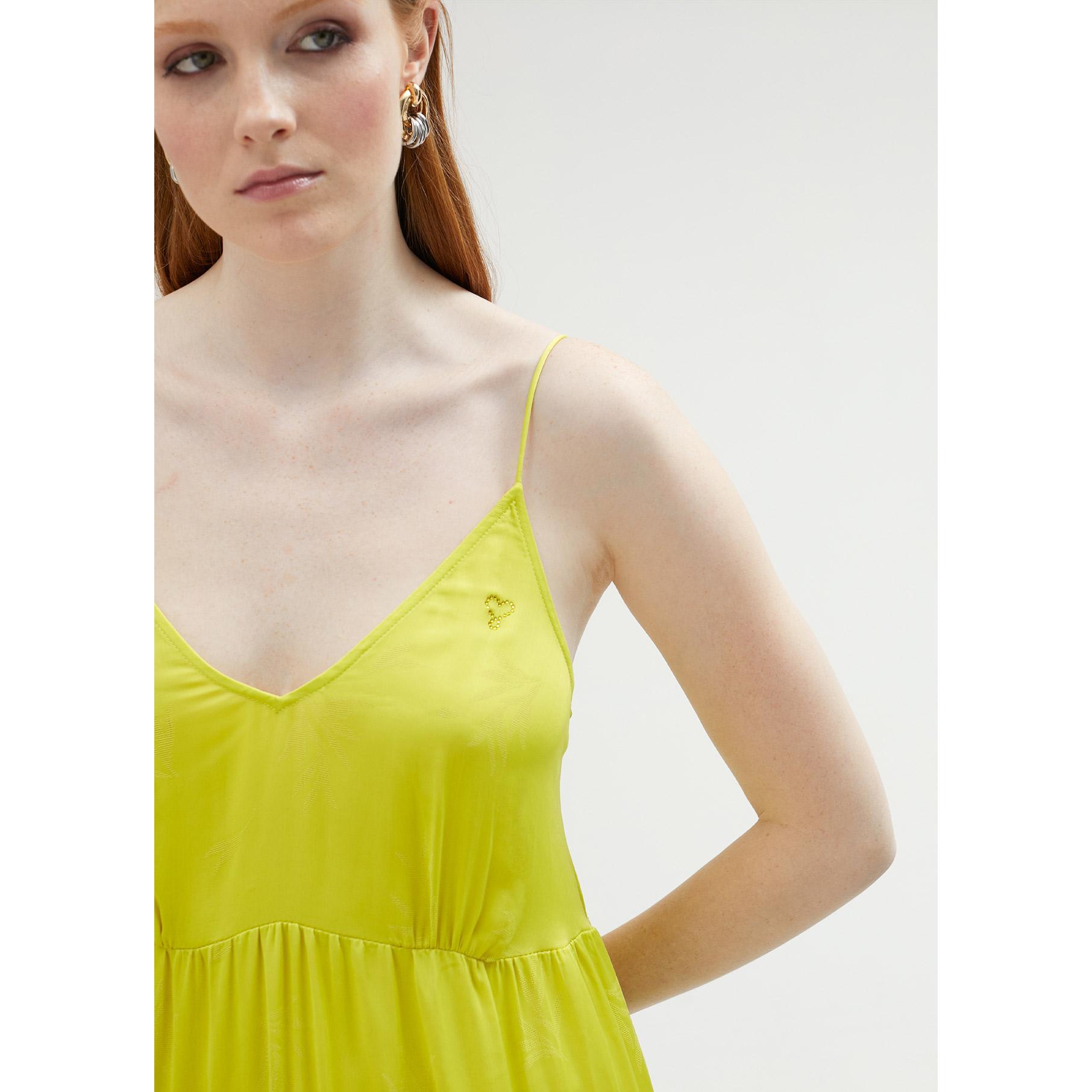 Vestito con spalline e volant