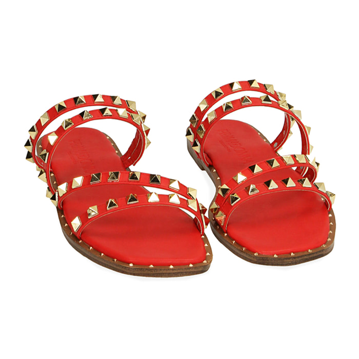 Sandalias planas rojas con tachuelas