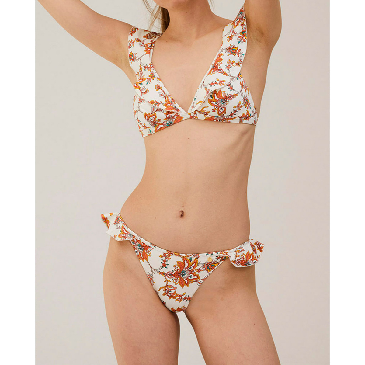 Top de bikini con volante y estampado de flores