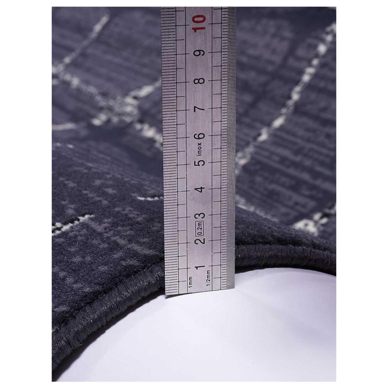 Petit tapis d'entrée motif géométrique déformé gris et beige