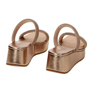 Cuñas rosadas-oro en laminado