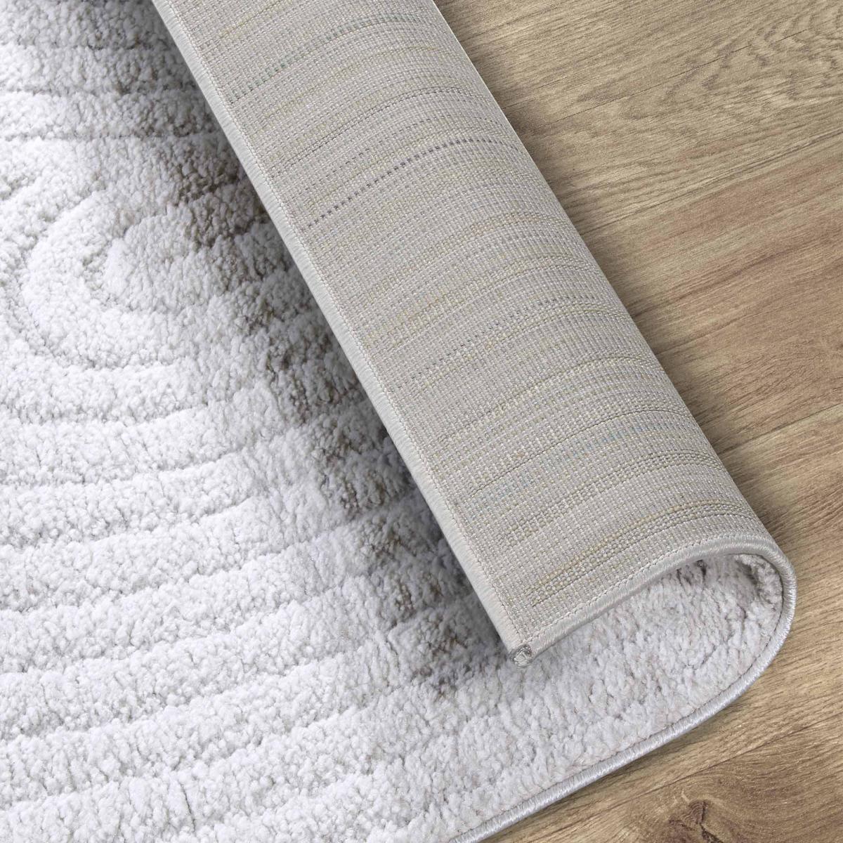 Tapis salon, motif géométrique, texture relief, lym chaleureux