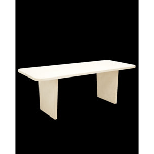 Table à manger en microciment de teinte blanc cassé disponible en différentes tailles